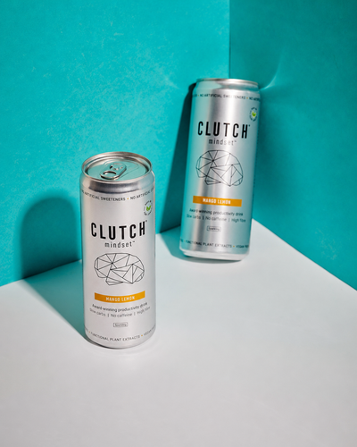 Two CLUTCH Mindset Mango Lemon caffeine-free focus drink cans
